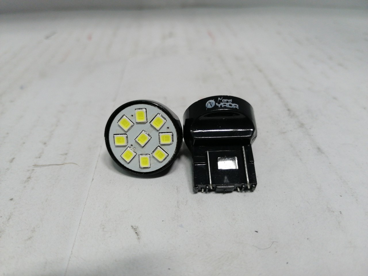 Купить запчасть NORD YADA - 901982 Лампа светодиодная T20 -7443 (9SMD)W21/5W WHITE (габарит,стоп-сигнал д/ яп.авто)12V 0.532W 4lm