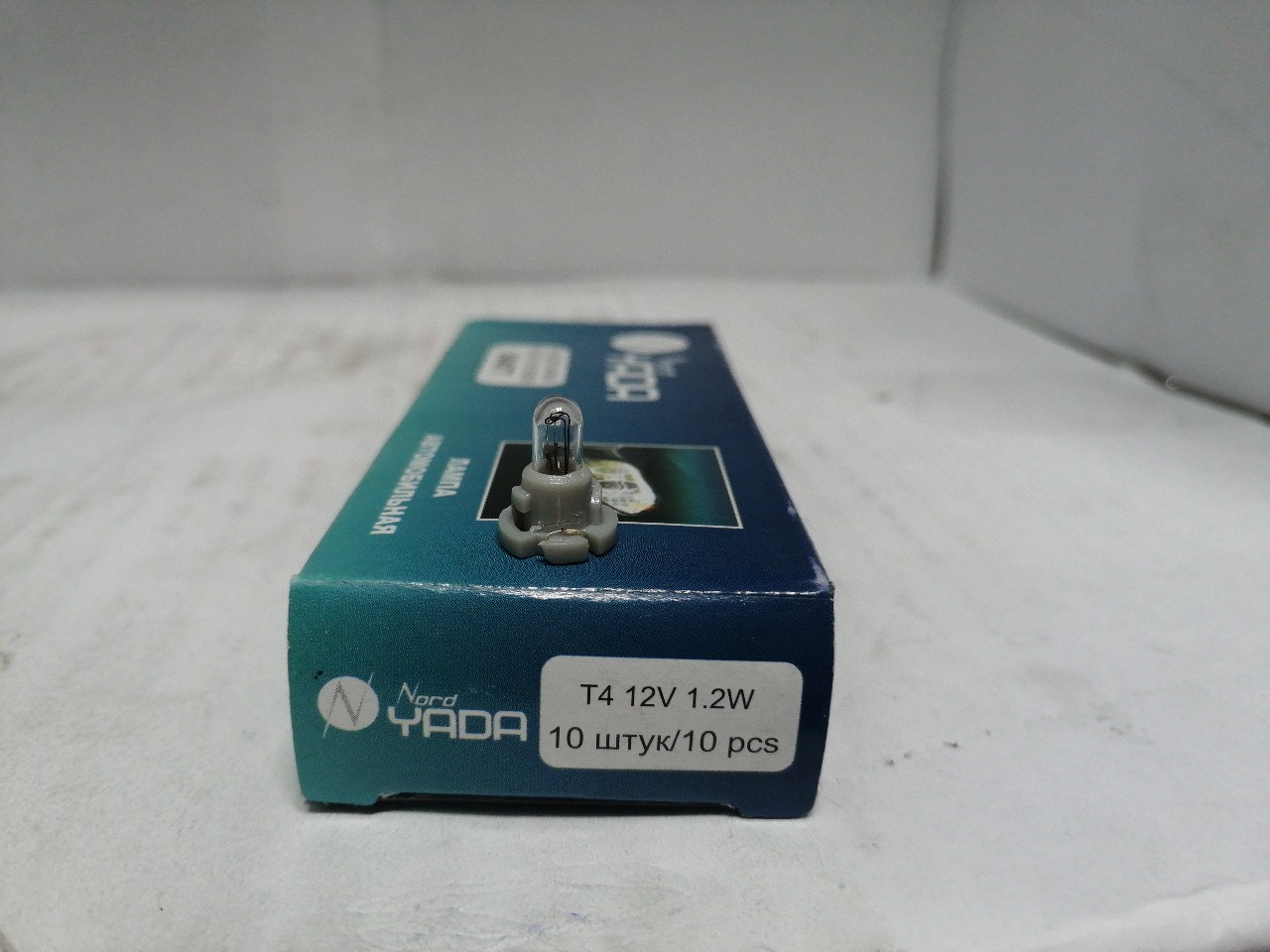 Купить запчасть NORD YADA - 904677 Лампа щитка пр. 12V W1.2W T5 без цок. с усами T4 с сер. патрон.