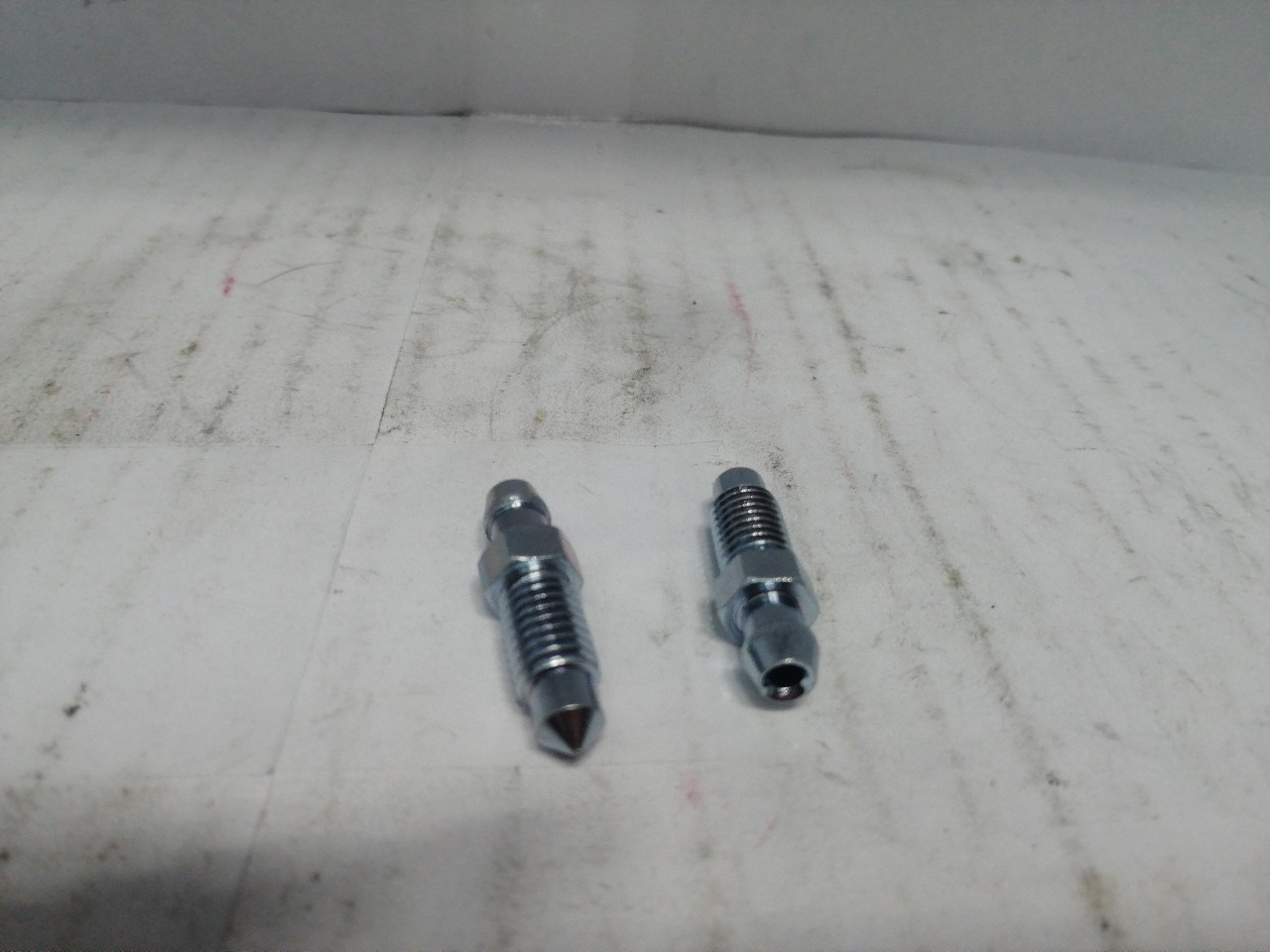 Купить запчасть QUICK BRAKE - 0015 Штуцер прокачки M8X1,25, L=32,4MM, S=9 CITROEN,MERCEDES BENZ,OPEL,SKODA,HONDA